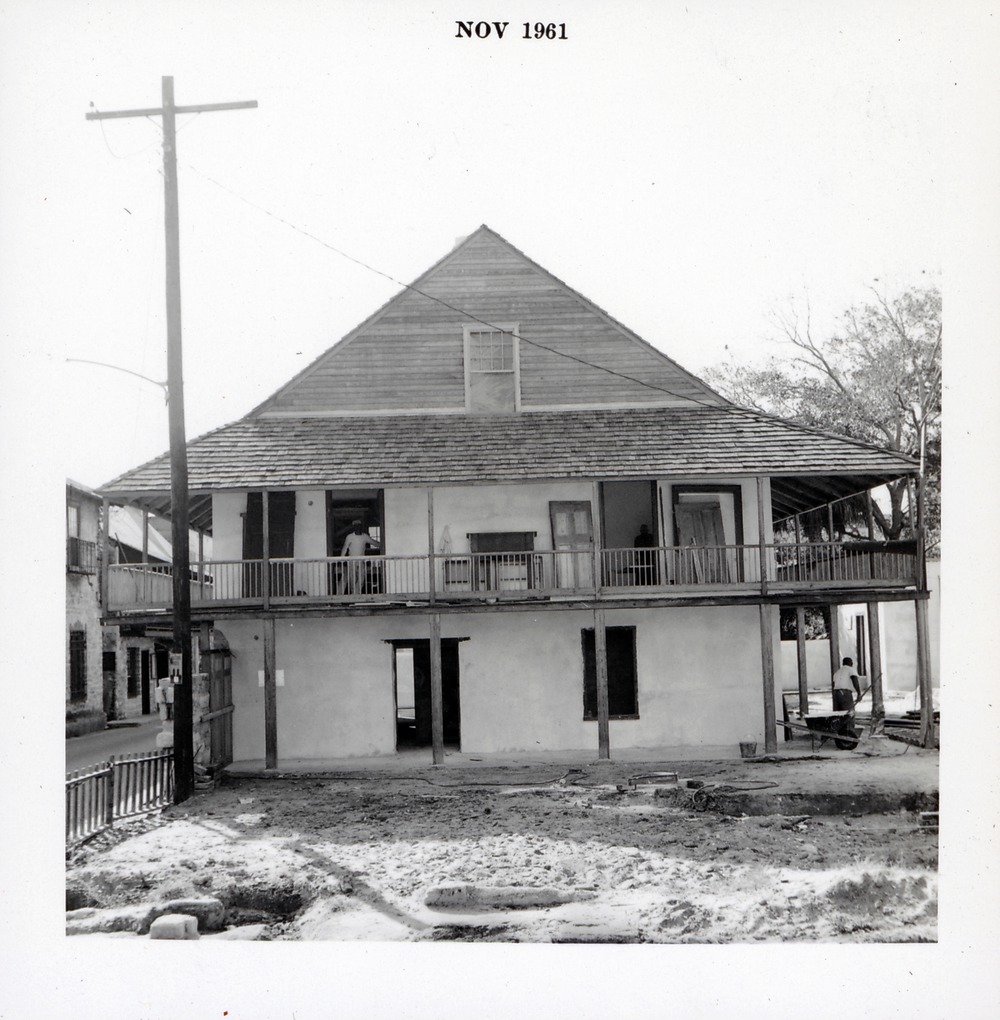 North elevation of the Arrivas House during restoration with balcony and roof complete, facing South, 1961