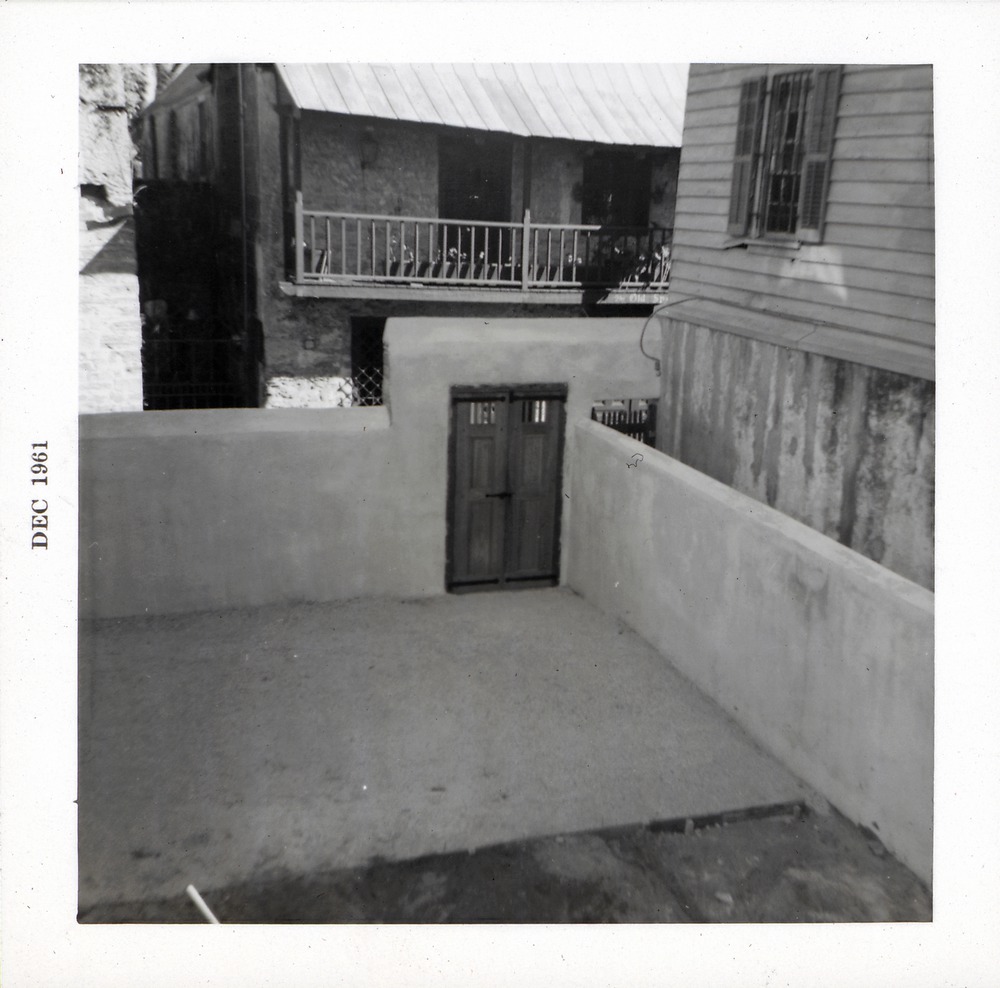 South patio of the Arrivas House and gateway to St. George Street, facing East, 1961