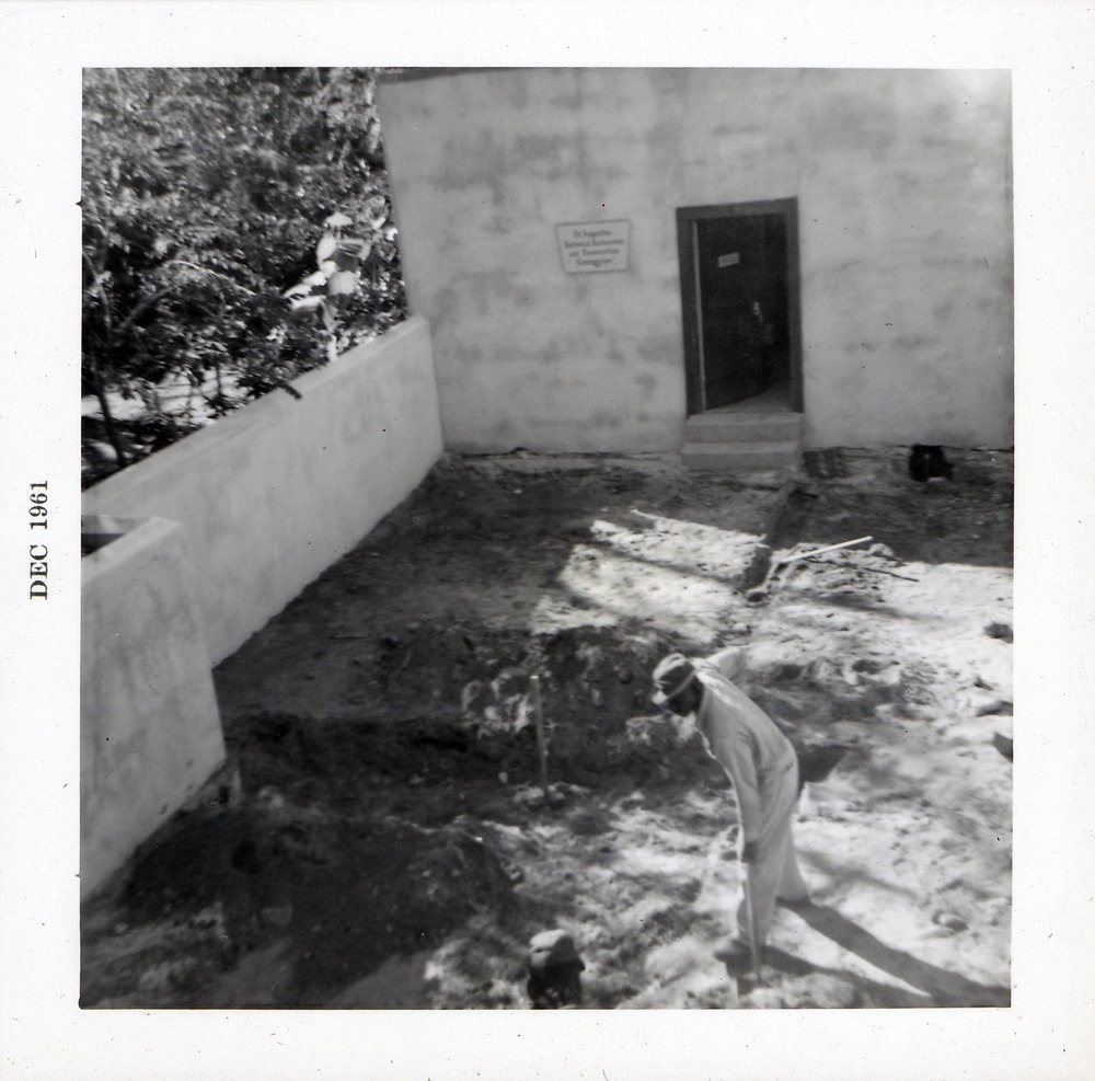 Southwest corner of Arrivas House lot with St. Augustine Historical Restoration and Preservation Commission offices in back garage area, facing West, 1961