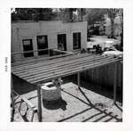 [1962] Constructing the grape arbor over the coquina well behind Arrivas House and the office building, from the balcony looking Southwest, 1962