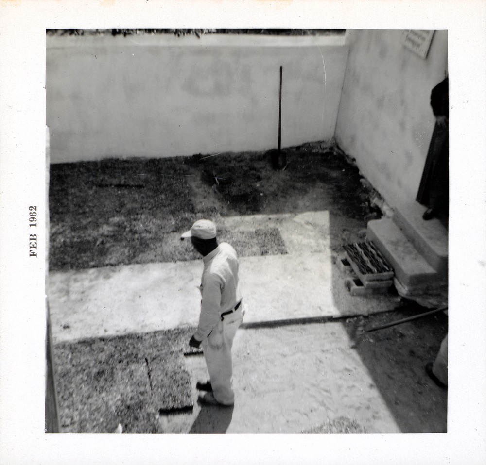 Laying sod in the southwest corner of the Arrivas House lot,, looking South, 1962