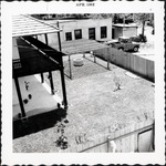 The rear yard of Arrivas House and St. Augustine Historical Restoration and Preservation Commission office building, looking South, 1962