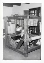 [1967] A woman weaving cloth on a loom in Arrivas House