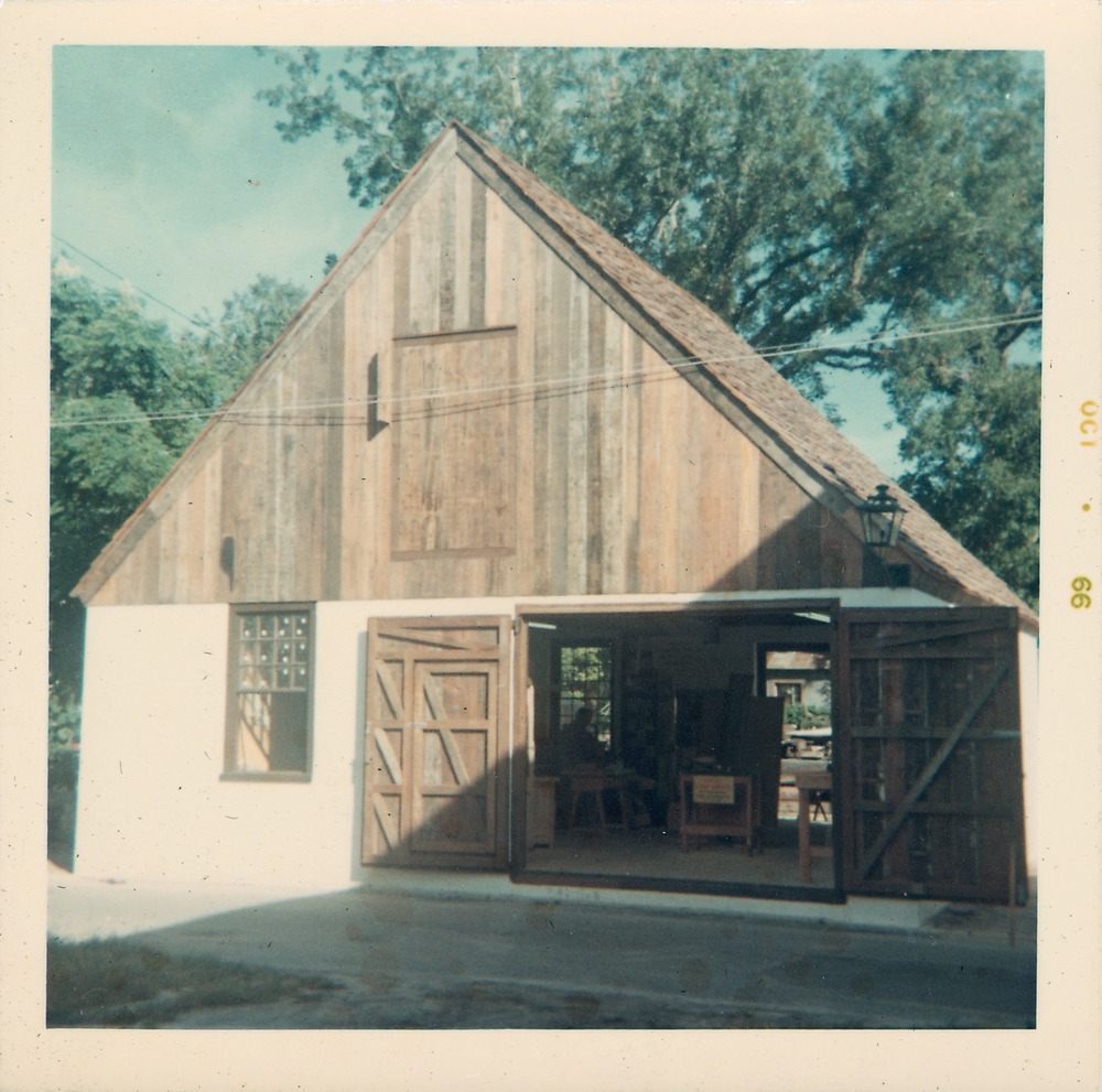 Coquina Warehouse with woodworker inside, from Cuna Street, looking North, 1966