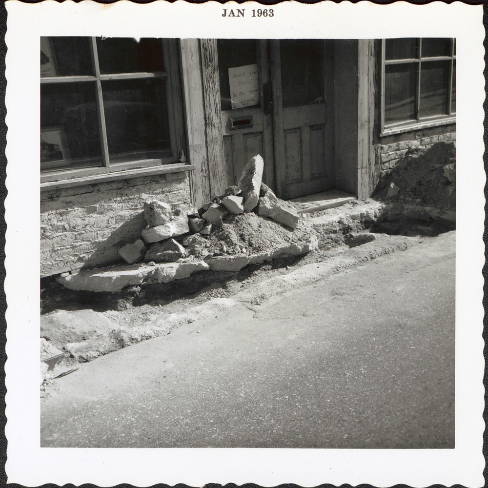 Exposing west wall footing and original tabby floor at the front door of Benet House prior to restoration, looking Southeast, 1963
