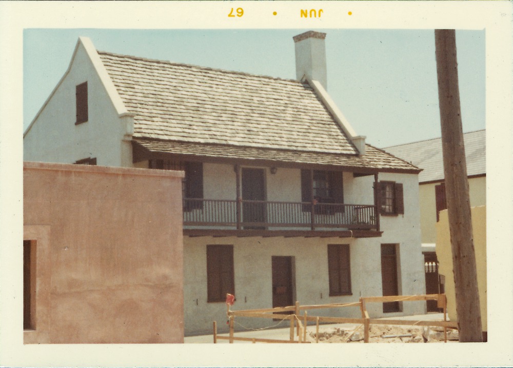 West elevation of Benet House from behind the Sanchez de Ortigosa Hosue, looking West, 1967