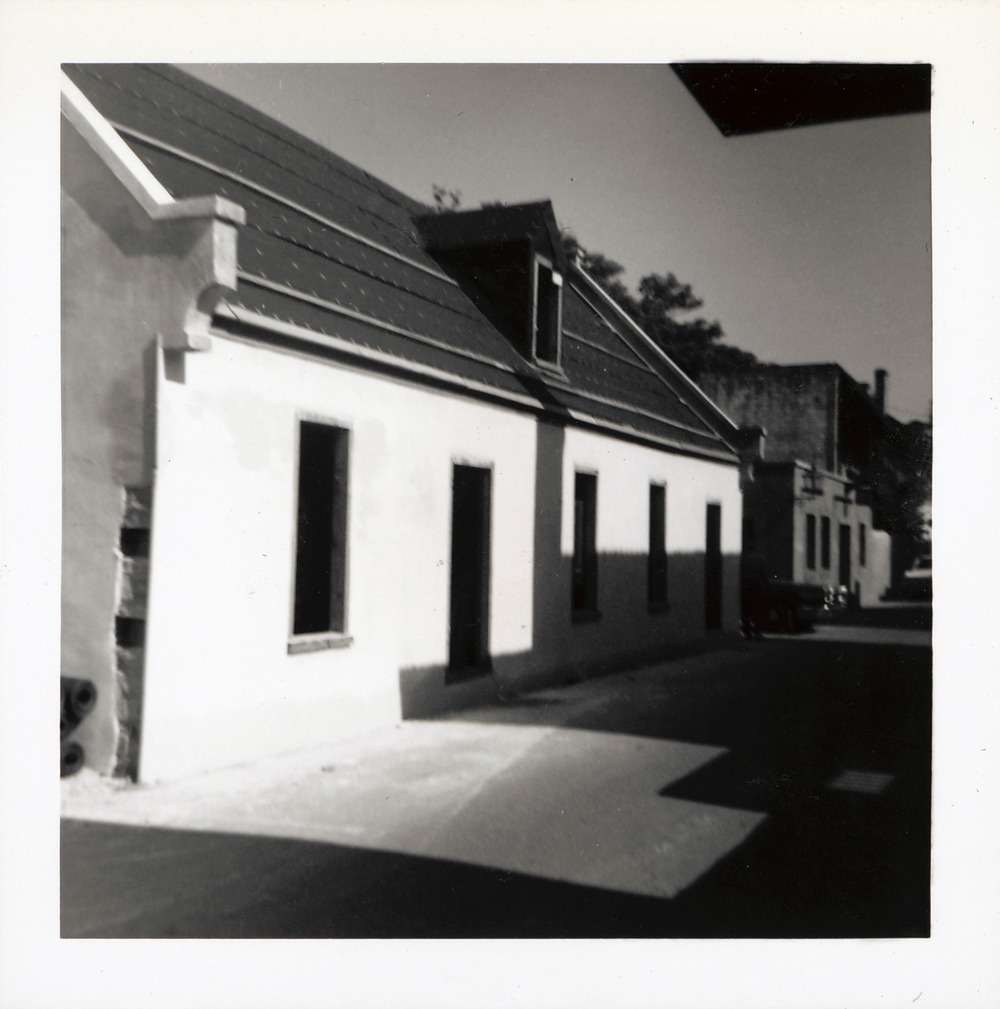 Finishing the roof on the reconstructed Benet Store, August 1967 - 