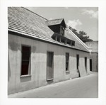 Finishing the roof on the reconstructed Benet Store, August 1967