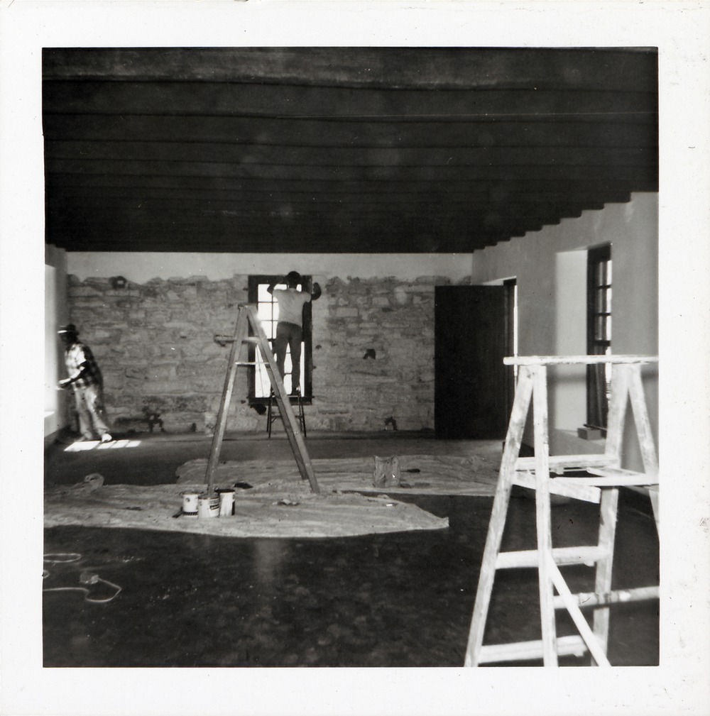 Applying stucco to the interior first floor walls of the Benet Store, 1967 - 
