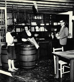 Rita O'brien (left), Jeanne Kiser (center), and Bradley G. Brewer (right) pose in the Benet Store for a promotional photograph, 1967