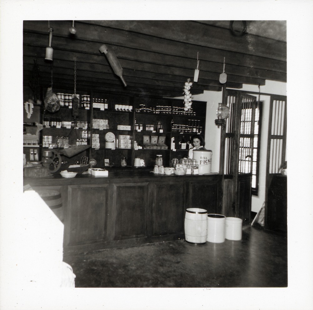 Jeanne Kiser behind the counter in the Benet Store, 1967