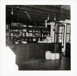 Jeanne Kiser behind the counter in the Benet Store, 1967
