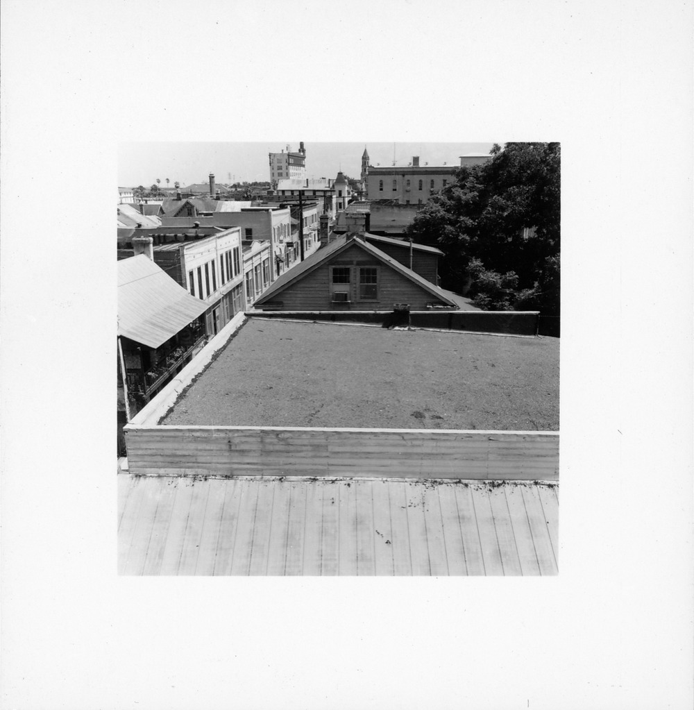 Aerial view of St. George Street from rooftops (roof of Arrivas House in foreground), looking South, ca. 1963