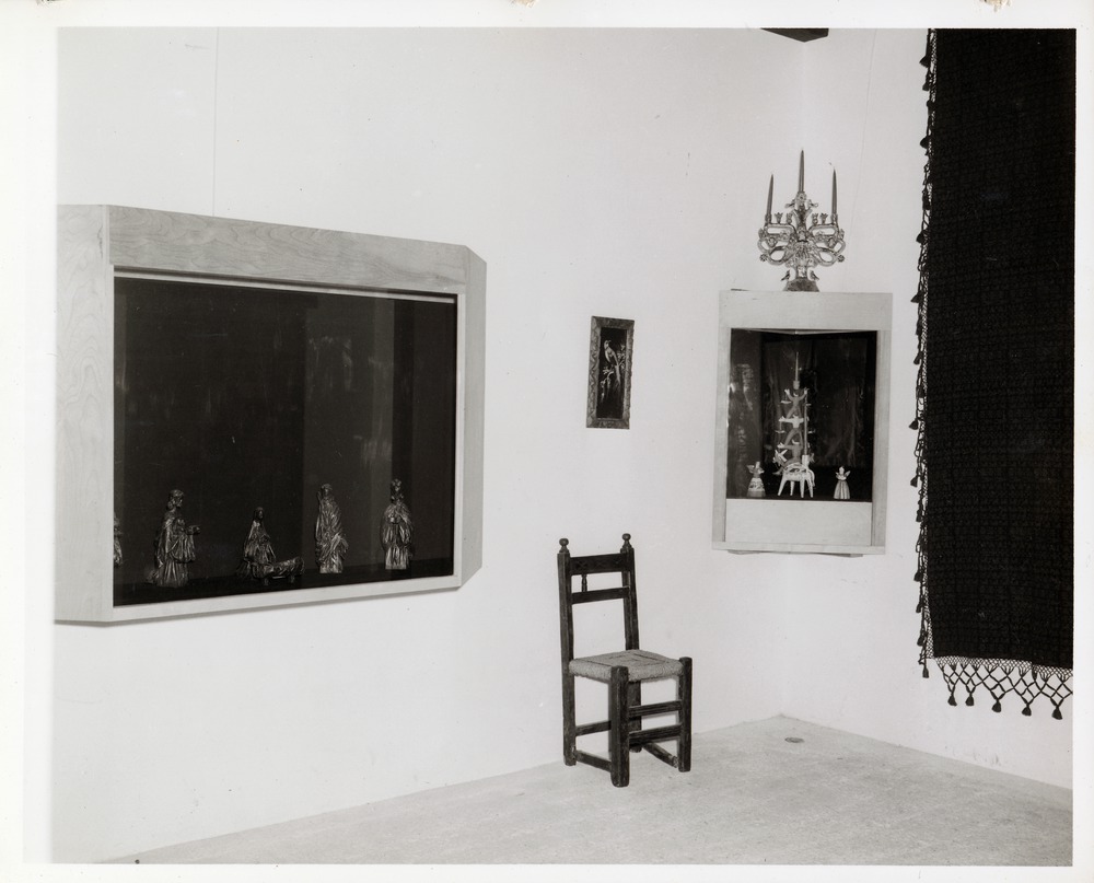 Interior view of the Marin-Hassett House as the Pan American Center, showing artifacts on display, 1966