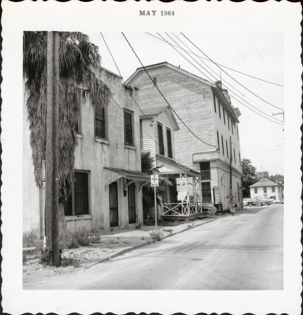 The rear of the Weinstein Grocery from Hypolita Street, looking West, 1964