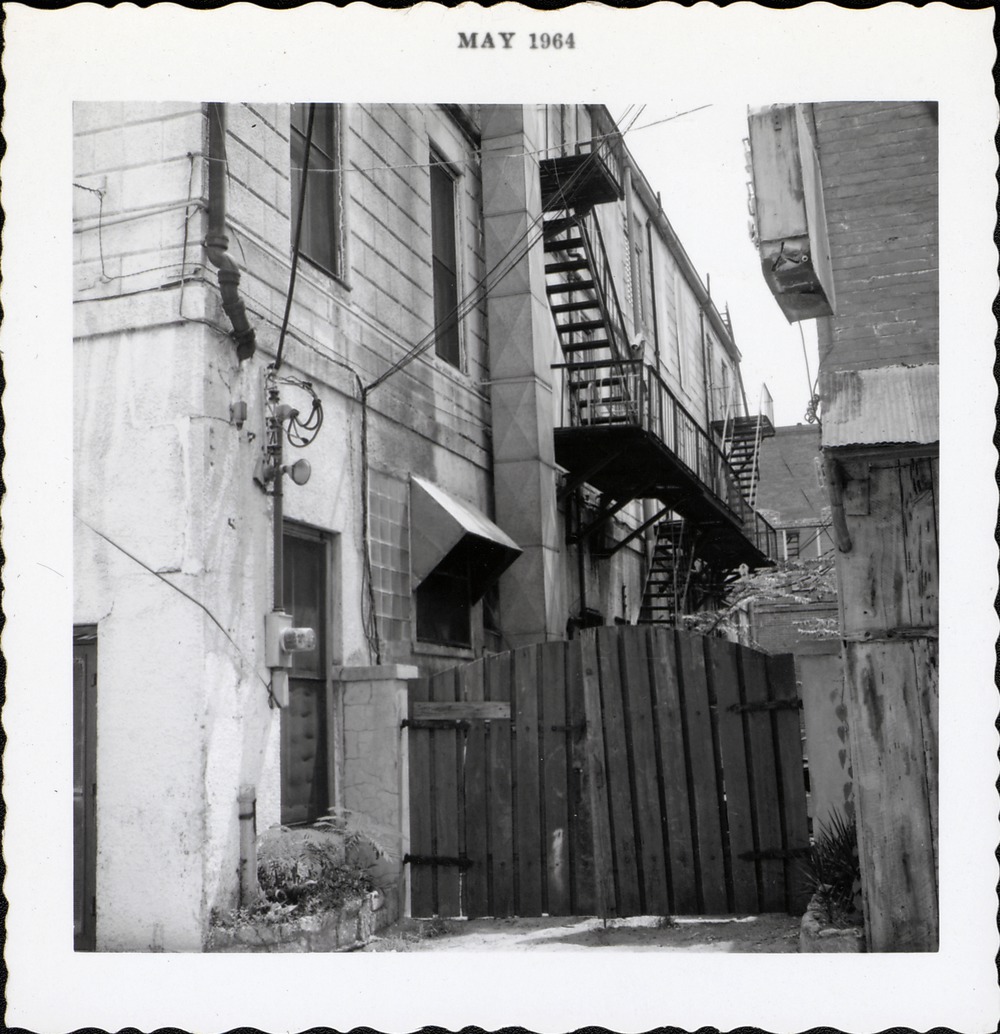 Alley behind the Bernstein Building, prior to demolition, from Aviles Street, looking East, 1964