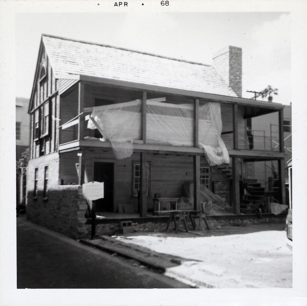 Construction of Watson House, finishing balconies and clapboard siding, from Charlotte Street, looking Southwest