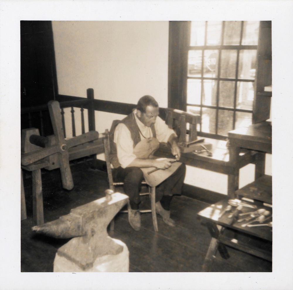 Silversmith at work in the Sims House, 1967