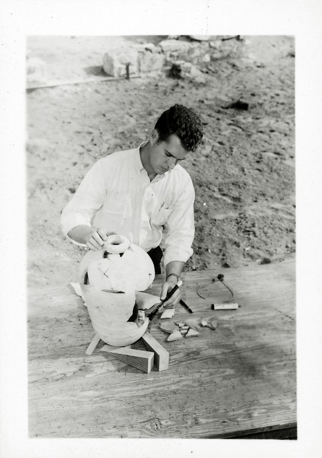 Robert Steinbach re-assembling an olive jar during excavations at the Salcedo House