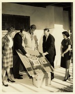Marion E. Randolph, Robert Gold,Robert H. Steinbach, Earle W. Newton, and Rita H. O'Brien on the back porch of the Arrivas House, 1962