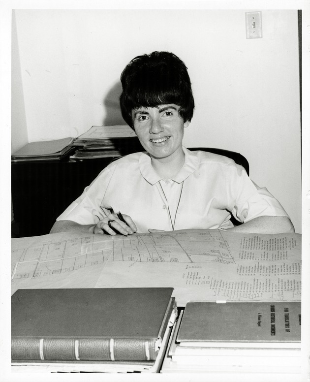 Joyce Harman at desk analyzing Drost Overlay Maps - 