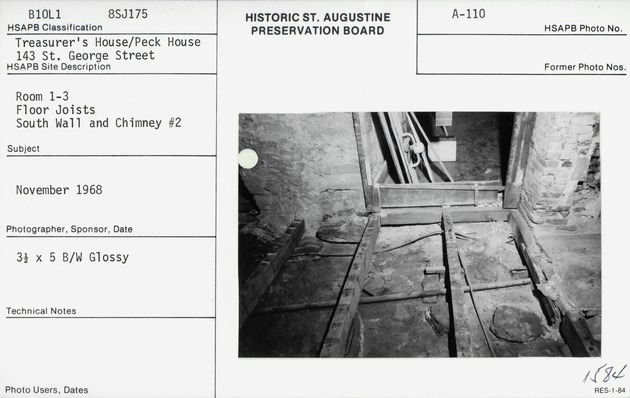 Exposed floor joists in Room 3 on the first floor of the Peña-Peck House during restoration, looking South