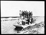 Prospective land purchasers, in a boat, approximately 1913